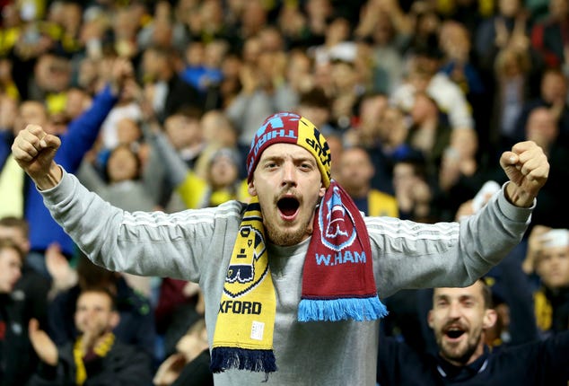 An Oxford fan shows his support