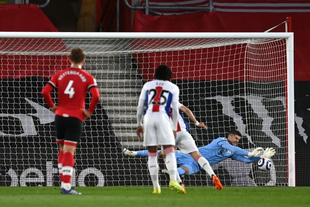 Fraser Forster saves Luka Milivojevic''s penalty