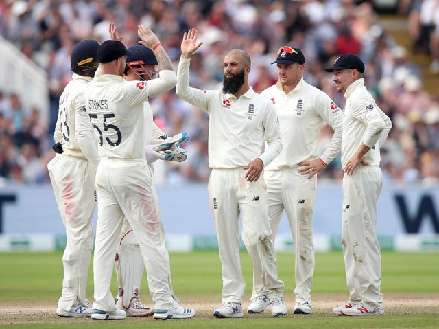 Moeen Ali, centre, has taken an indefinite break from Test cricket (Nick Potts/PA)