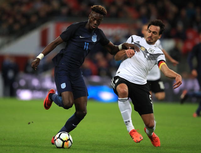 Abraham (left) made his senior England debut against Germany in November 2017 (Mike Egerton/PA).