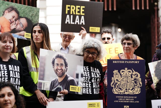 Laila Soueif (centre) taking part in a vigil for her son