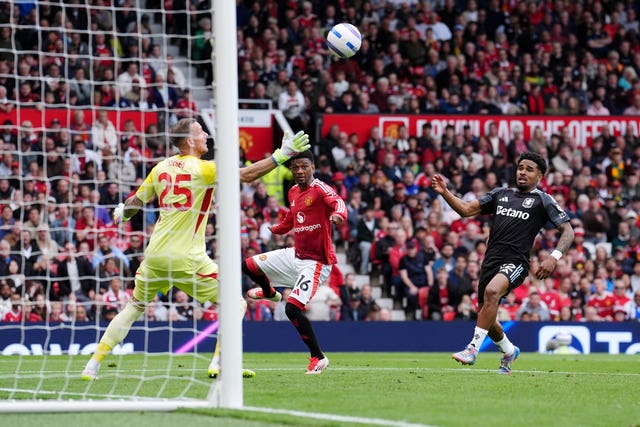 Amad Diallo, centre, scores Manchester United’s first goal