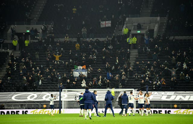 Tottenham players applauded the 2,000 fans after the game