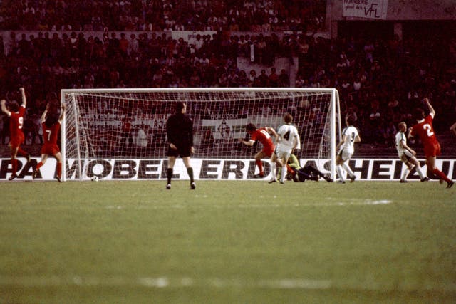 Liverpool’s Terry McDermott celebrates scoring the opening goal