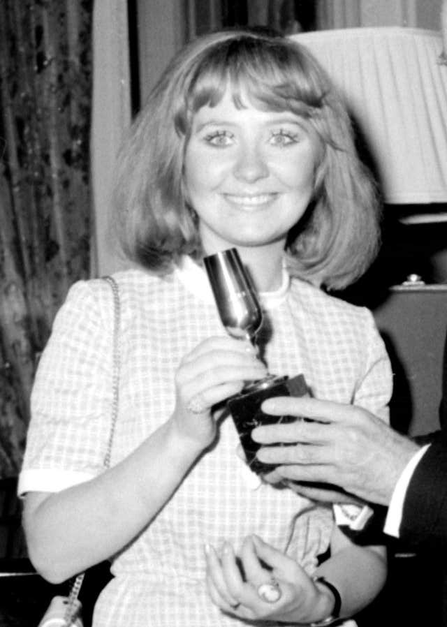 British singer Lulu with her trophy after coming joint first in the Eurovision Song Contest with her song, Boom Bang-A-Bang (PA)