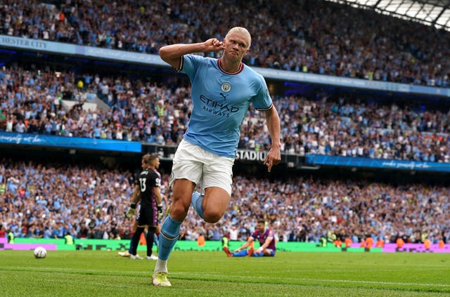 Erling Haaland celebrates his hat-trick goal