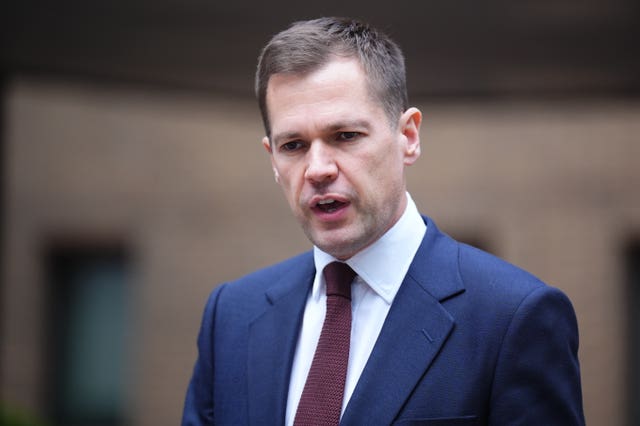 Shadow justice secretary Robert Jenrick speaks to the media