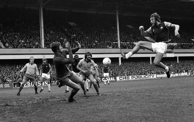 Dai Davies, playing for Everton, saves from West Ham captain Billy Bonds