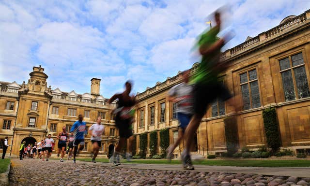 Clare College, Cambridge was the location for the famous movie scene rather than Trinity