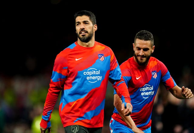 Luis Suarez warms up prior to the UEFA Champions League round of sixteen second leg match at Old Trafford, Manchester