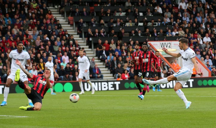 Aaron Cresswell, right, scores West Ham's equaliser