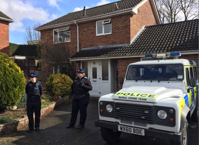 Police Community Support Officers standing outside the Salisbury home of Sergei Skripal (Ben Mitchell/PA)