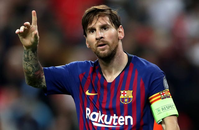 Barcelona’s Lionel Messi celebrates scoring a goal against Tottenham