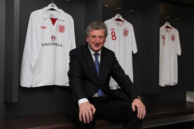 Roy Hodgson poses for a photograph in the dressing room at Wembley Stadium
