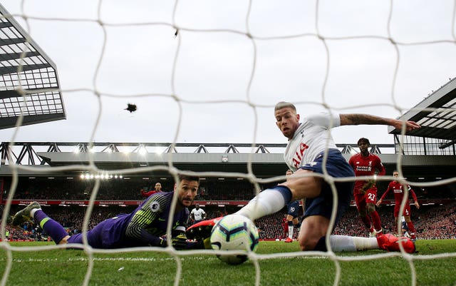 Tottenham's Toby Alderweireld, right, scores an own goal to hand Liverpool victory