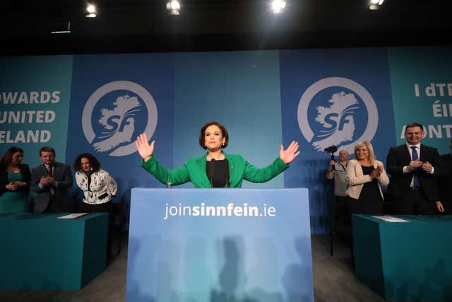 Mary Lou McDonald acknowledges the applause of delegates as she is elected as Sinn Fein's president at the party's special conference at the RDS in Dublin (Niall Carson/PA)