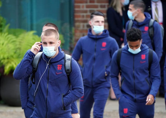 England's players file onto the coach