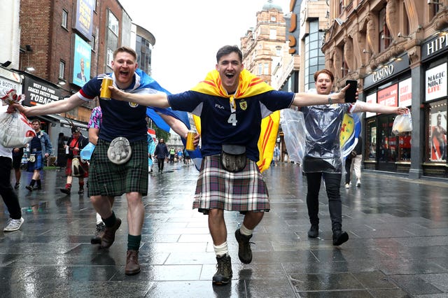 Scotland fans gather in Leicester Square before the England match
