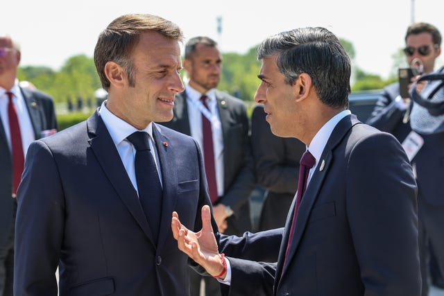 Prime Minister Rishi Sunak with President of France, Emmanuel Macron earlier on Thursday in Normandy