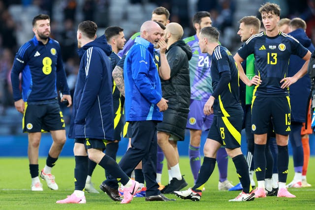Steve Clarke, centre, with his players after Scotland''s draw with Finland