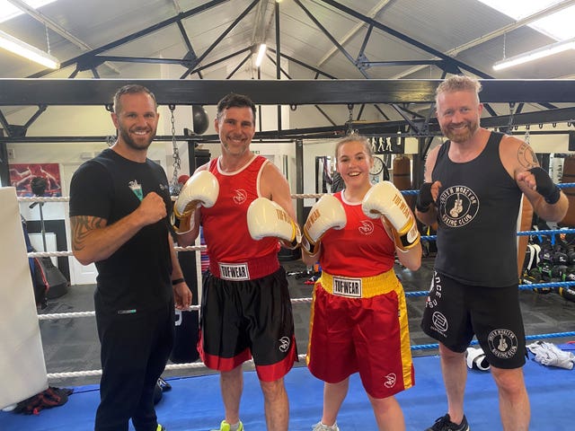 Charlotte Nichols and Stuart Bates in the boxing ring