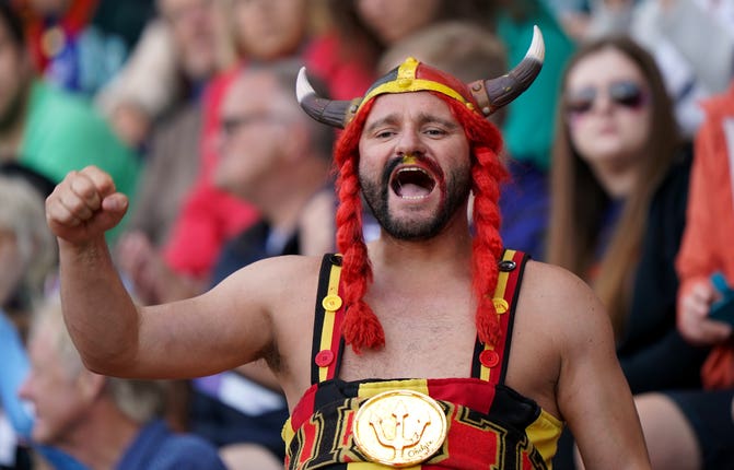 A Belgium fan shows his colours during the clash with France