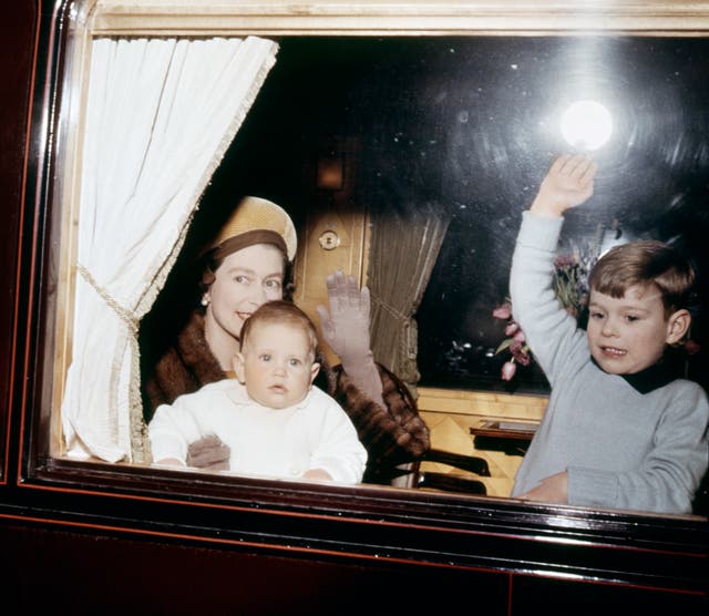 Queen and Prince Edward on a train