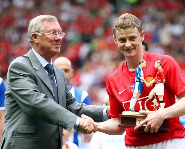 Solskjaer takes a different approach to management than his old mentor Sir Alex Ferguson, left