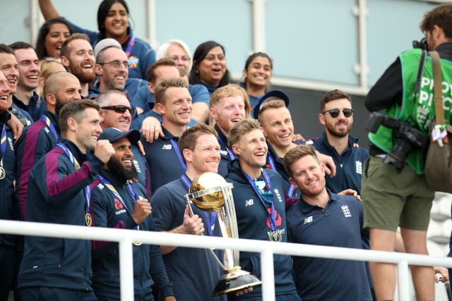 England’s Jos Buttler, Eoin Morgan, Joe Root and Jason Roy pose with the World Cup trophy 
