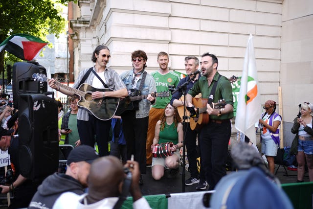 Musicians perform among supporters of Kneecap’s Liam Og O Hannaidh outside Westminster Magistrates’ Court in London