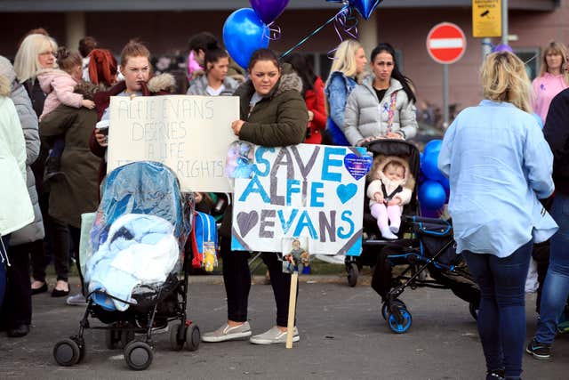 Protesters outside Alder Hey Children’s Hospital in Liverpool (John Stillwell/PA)