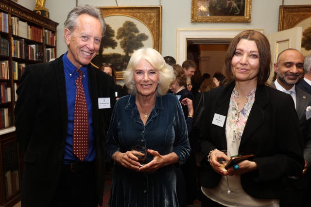 Camilla with Richard E Grant during a Clarence House reception