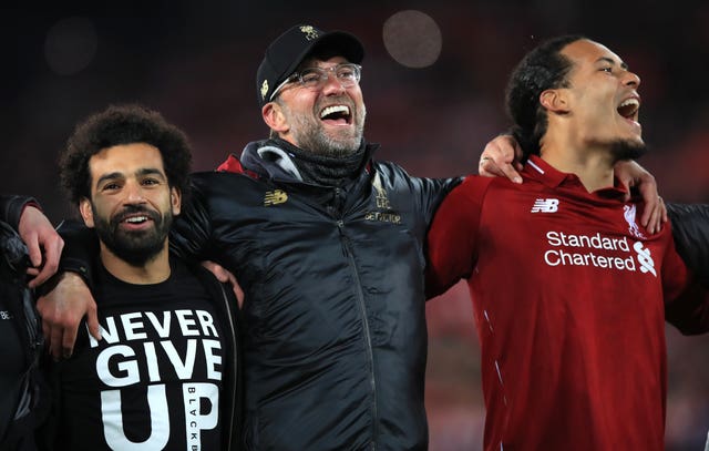 Jurgen Klopp celebrated on the pitch with his team following the win over Barcelona
