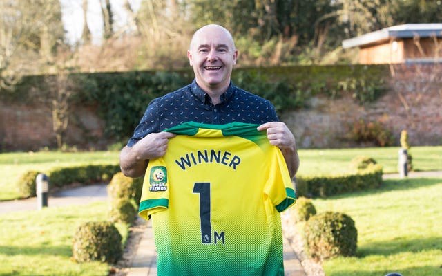 Terry Falgate celebrating his £1 million win on the UK EuroMillions Millionaire Maker at The Garden Room, Coltishall, Norfolk