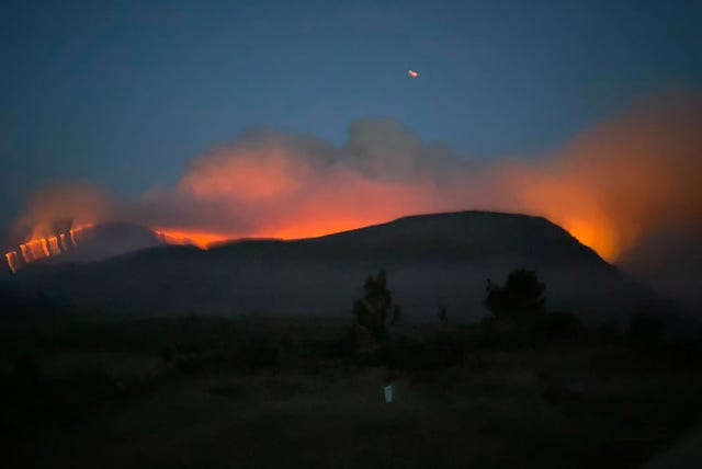 View of a wildfire on a hillside