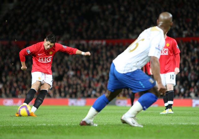 Cristiano Ronaldo scores a free-kick for Manchester United (PA)