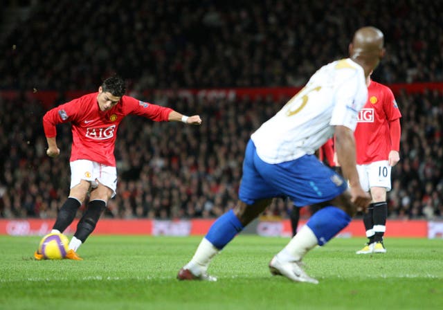 Cristiano Ronaldo scores a free-kick for Manchester United (PA)
