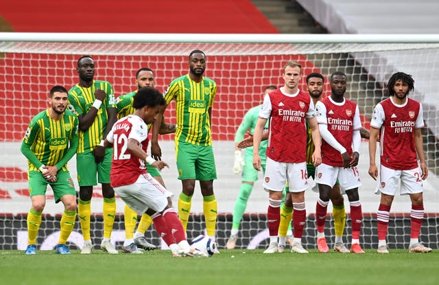 Willian's first Arsenal goal came with a fine last-minute free-kick as the Gunners relegated West Brom.