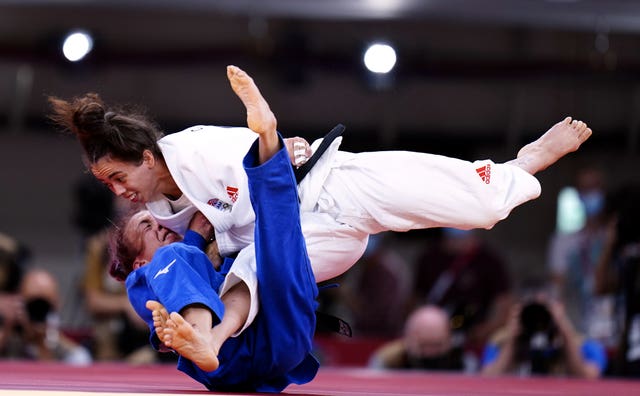 14 members of Giles' family gathered to watch her bring home the bronze medal