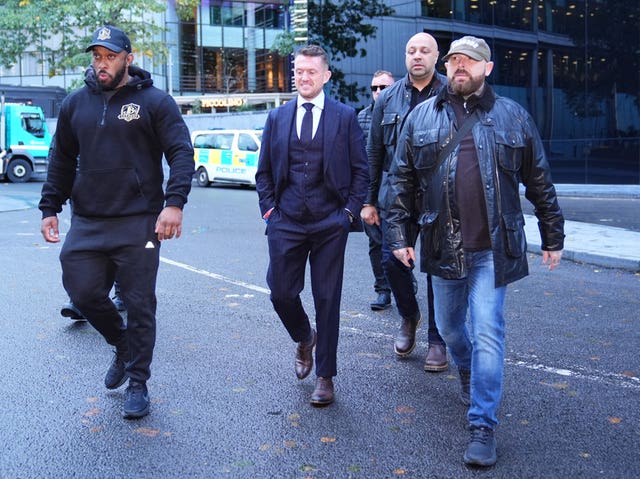 Tommy Robinson, centre, arriving at court on Thursday