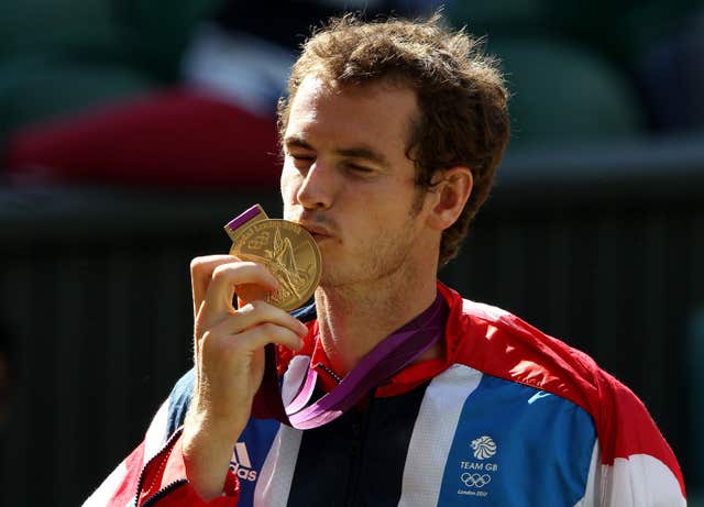 Andy Murray celebrates the first of his two Olympic golds