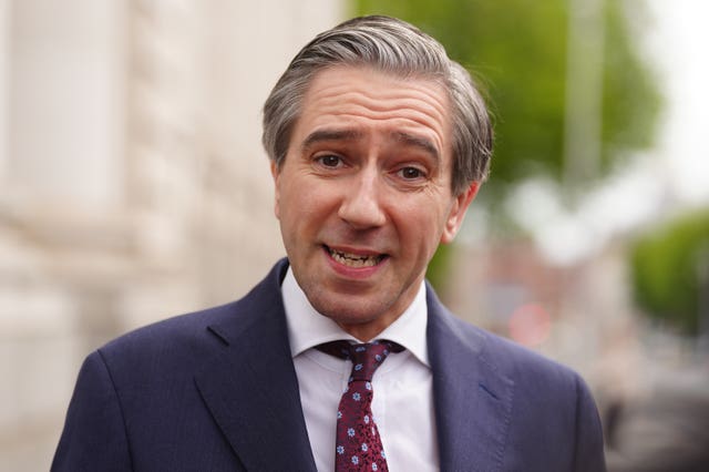 Simon Harris speaks to journalists