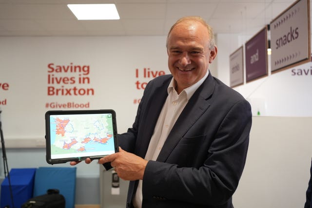 Sir Ed Davey donates blood