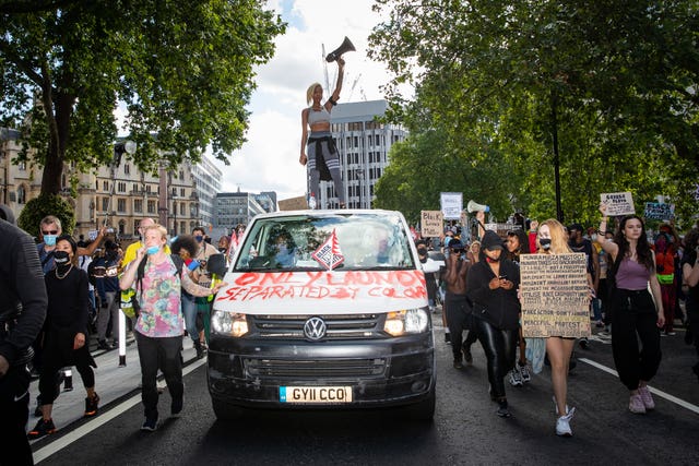 People during a Black Lives Matter rally in Parliament Square, London