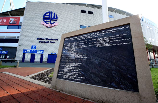 A plaque outside the University of Bolton Stadium