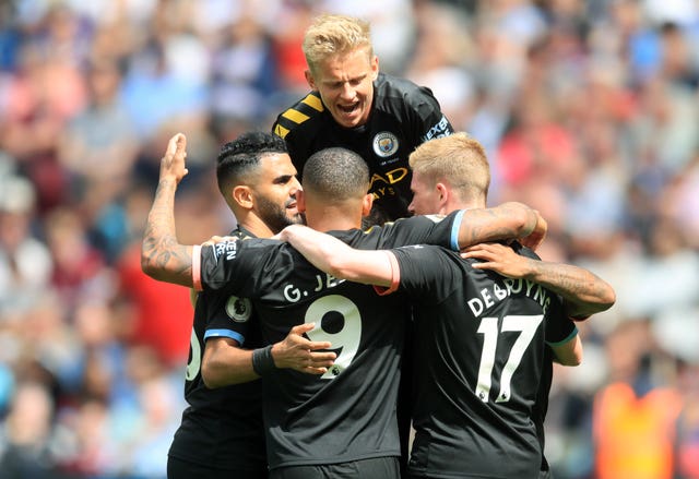 City celebrate after Raheem Sterling scored their second goal at West Ham