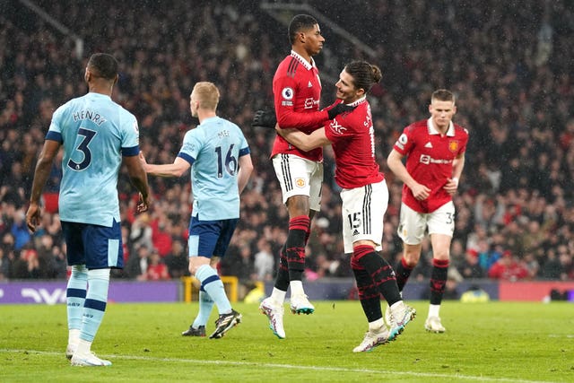 Marcus Rashford (centre) celebrates his goal