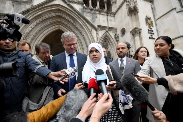 Shelina Begum and Mohammed Raqeeb (right) outside the Royal Courts of Justice