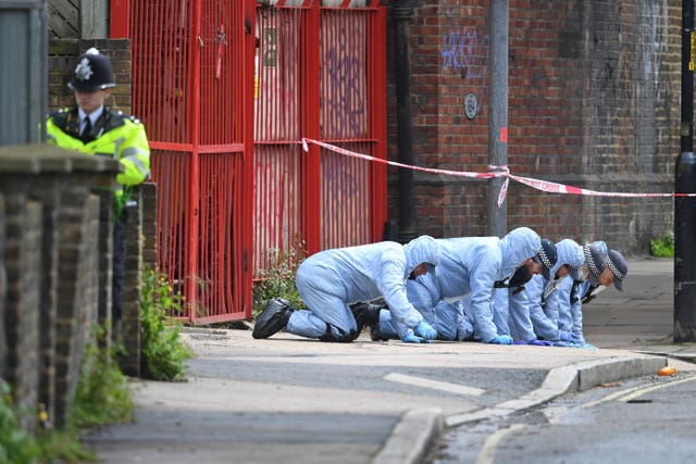 Police activity near the scene following the shooting