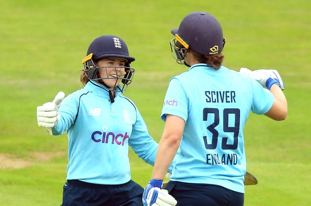 England's Tammy Beaumont and Nat Sciver (right) led England Women to victory over India in the first ODI
